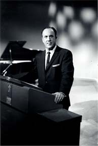 Dr. Jack standing at his pulpit
